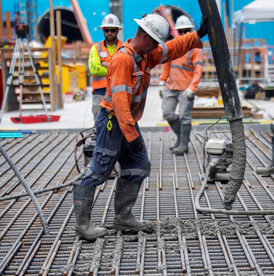 Steel reinforcement was installed before 1.4 metre thick slabs of concrete were poured in 18 x 23 metre sections to gradually form the floor of the station structure.